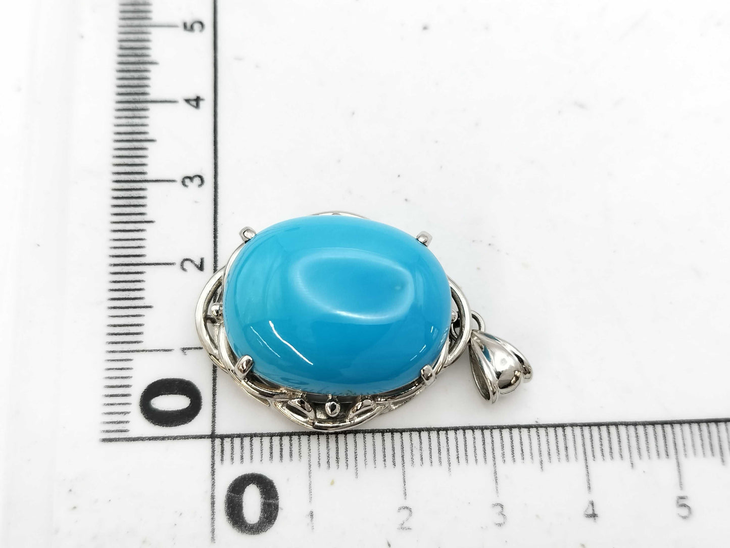 30.48ct colored stone pendant top in PT900