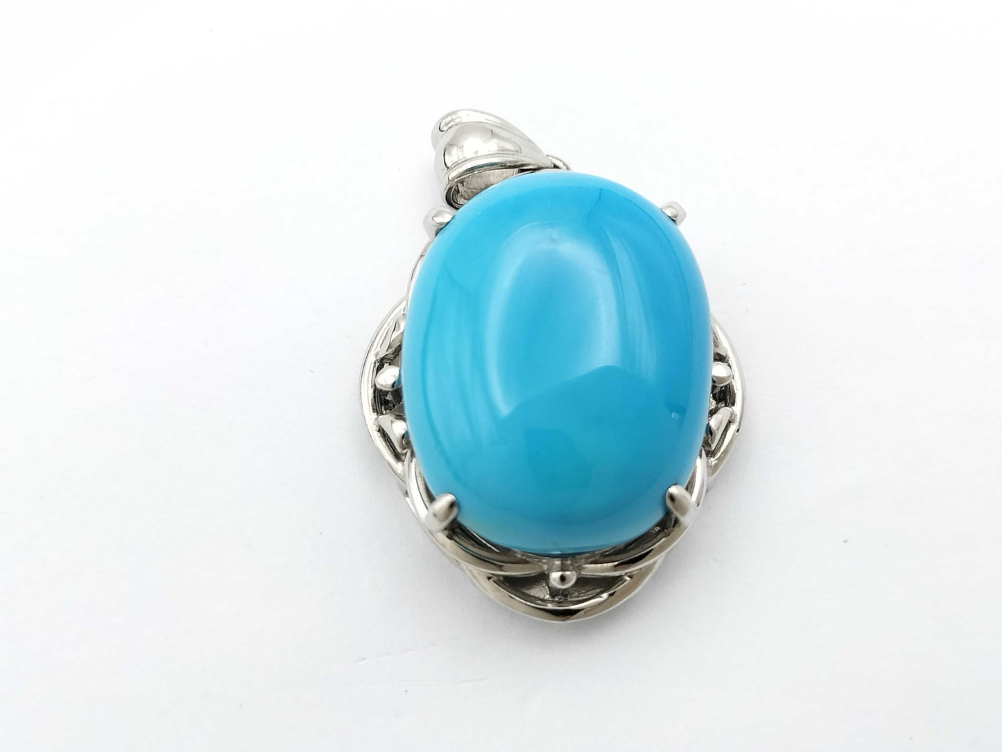 30.48ct colored stone pendant top in PT900