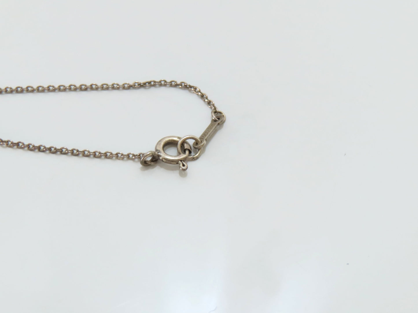 Tiffany & Co. TIFFANY & Co. Minor scratches on cross motif necklace in 925