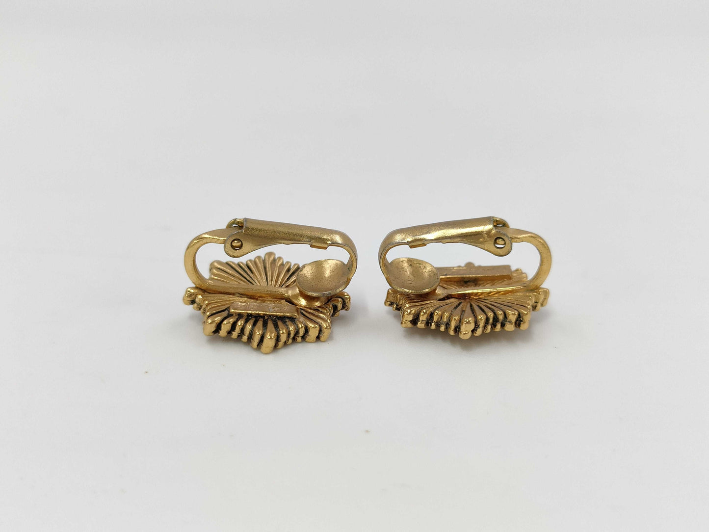 CHANEL engraved Coco Mark medal motif earrings