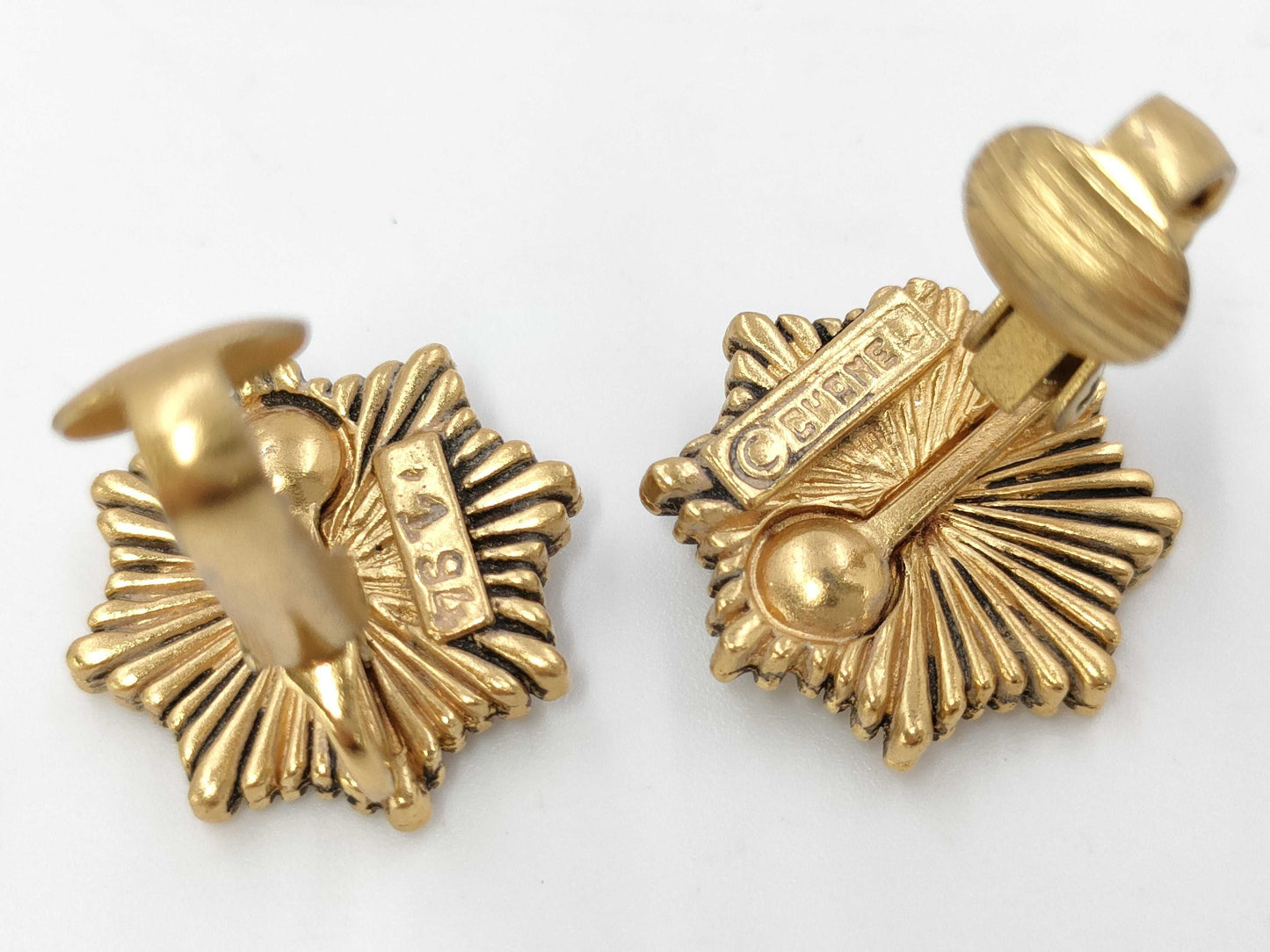 CHANEL engraved Coco Mark medal motif earrings