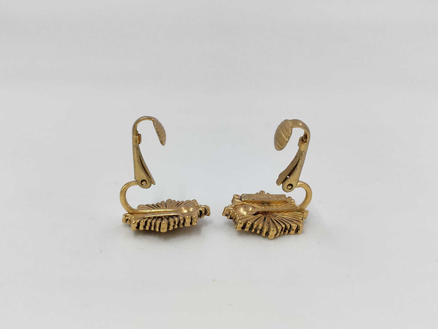 CHANEL engraved Coco Mark medal motif earrings