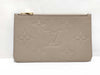 LOUIS VUITTON RFID verification impossible. Serial number verification impossible. Monogram Empreinte Louis Vuitton Neverfull Pouch in Taupe with Gold Hardware.
