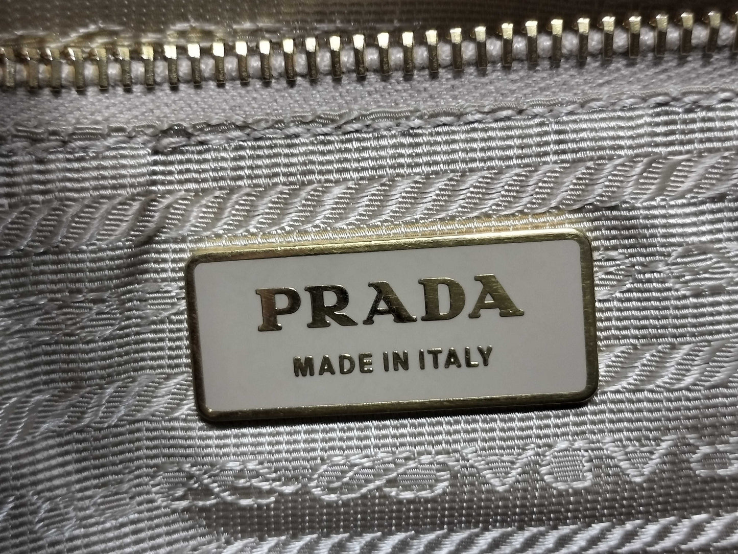PRADA nylon and leather shoulder bag with white tag