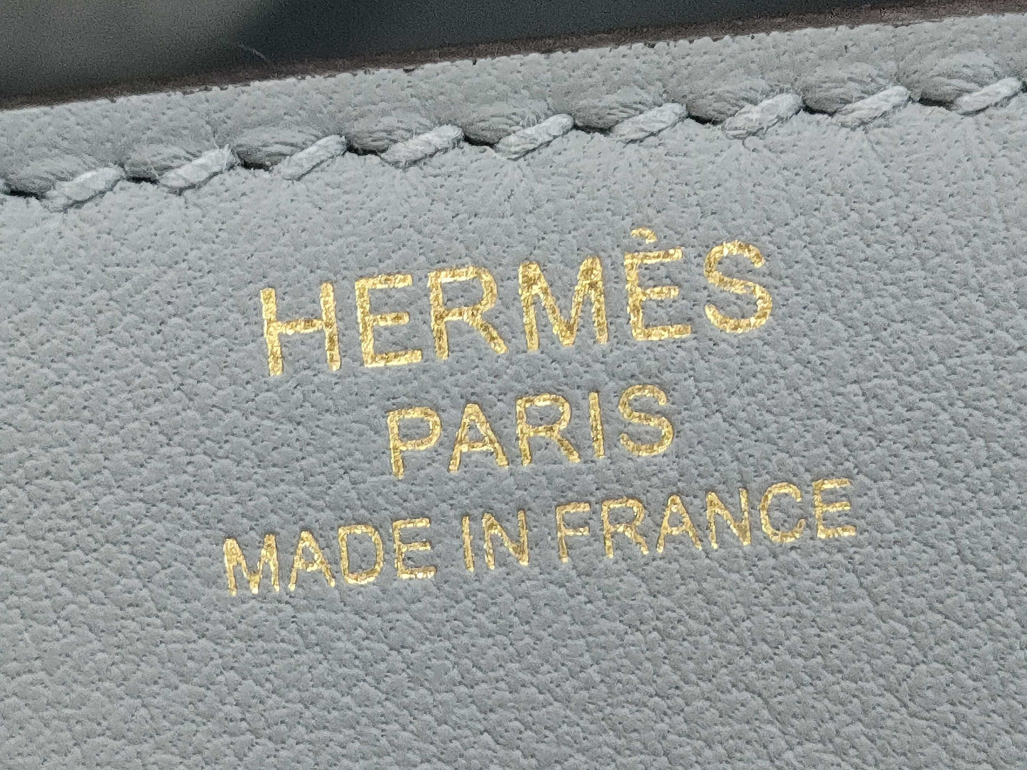 HERMES Birkin 25 in Platinum with Swift Champagne Gold Hardware and K Stamp.