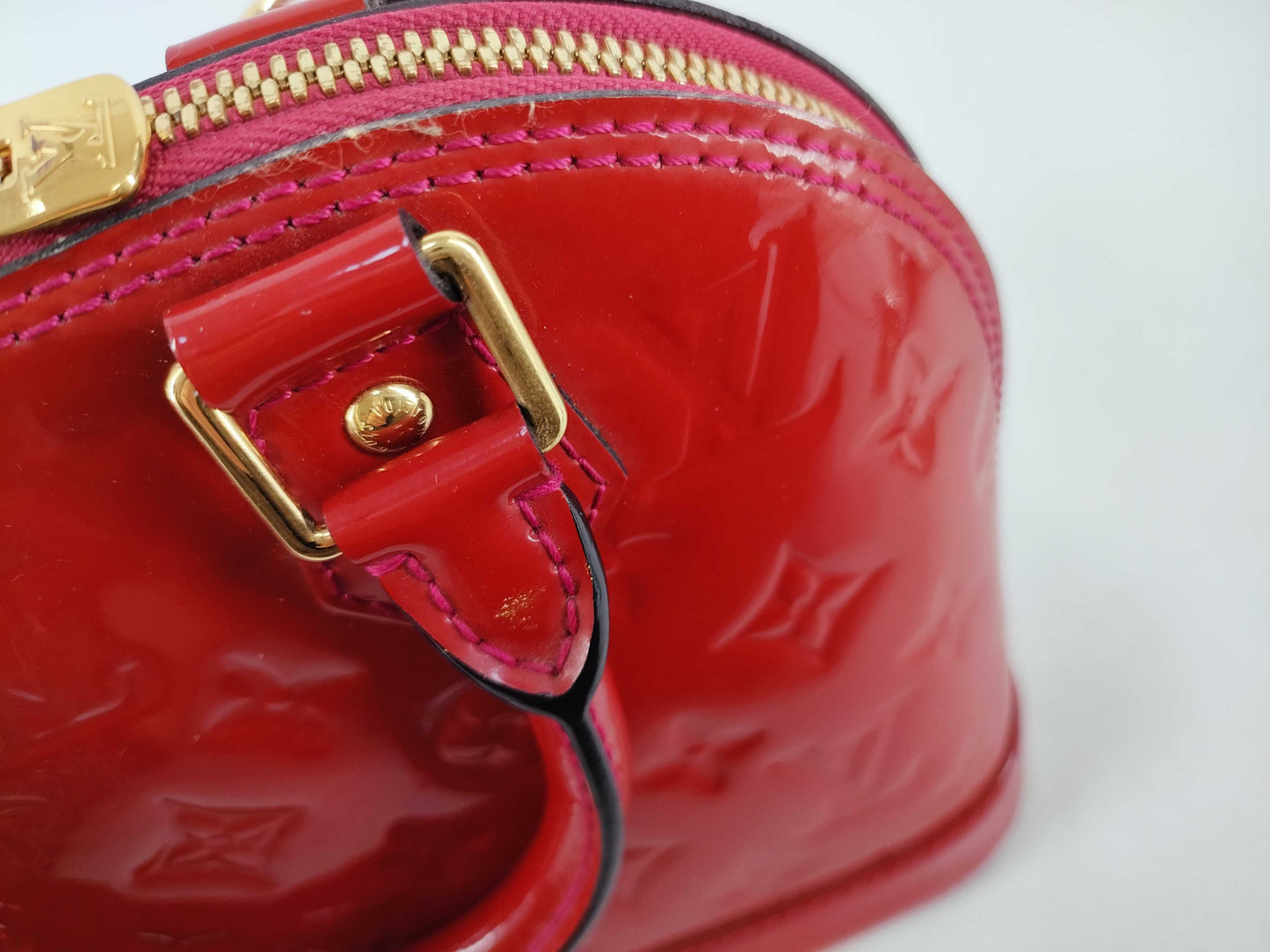 LOUIS VUITTON Vernis Louis Vuitton Alma BB Handbag with Serial Number