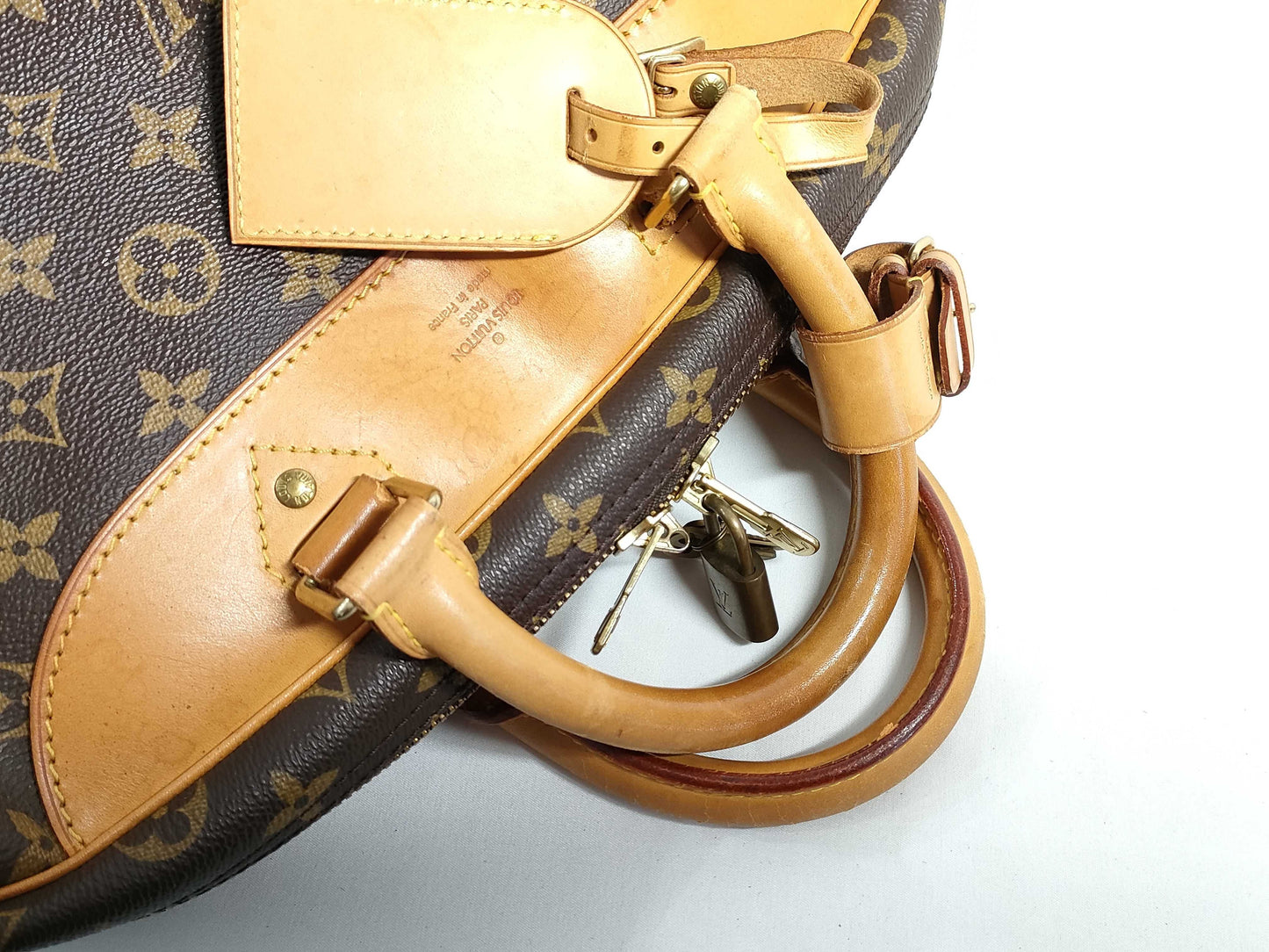 LOUIS VUITTON RFID verification failed. VI1918 Monogram Louis Vuitton Evasion Handbag.