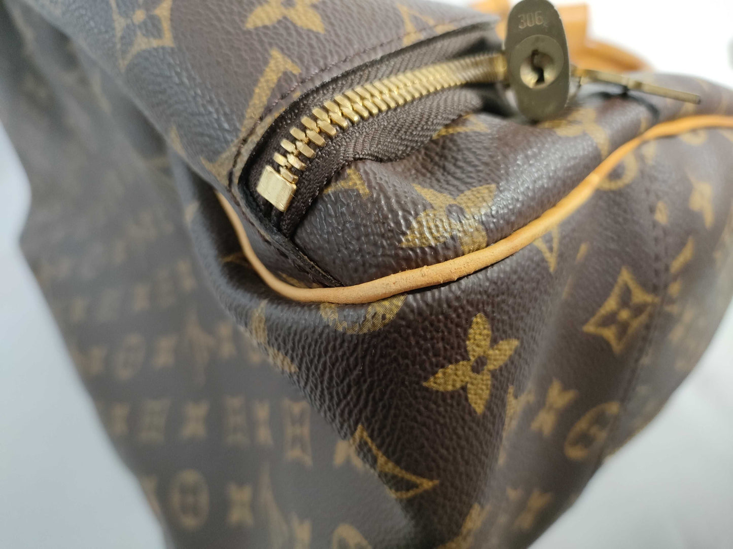 LOUIS VUITTON RFID verification failed. VI1918 Monogram Louis Vuitton Evasion Handbag.