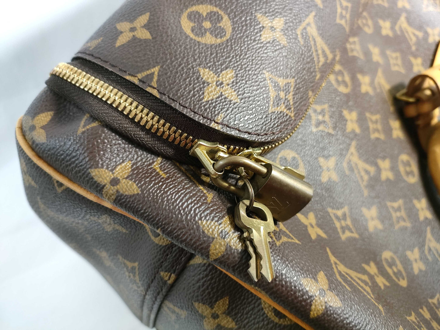 LOUIS VUITTON RFID verification failed. VI1918 Monogram Louis Vuitton Evasion Handbag.