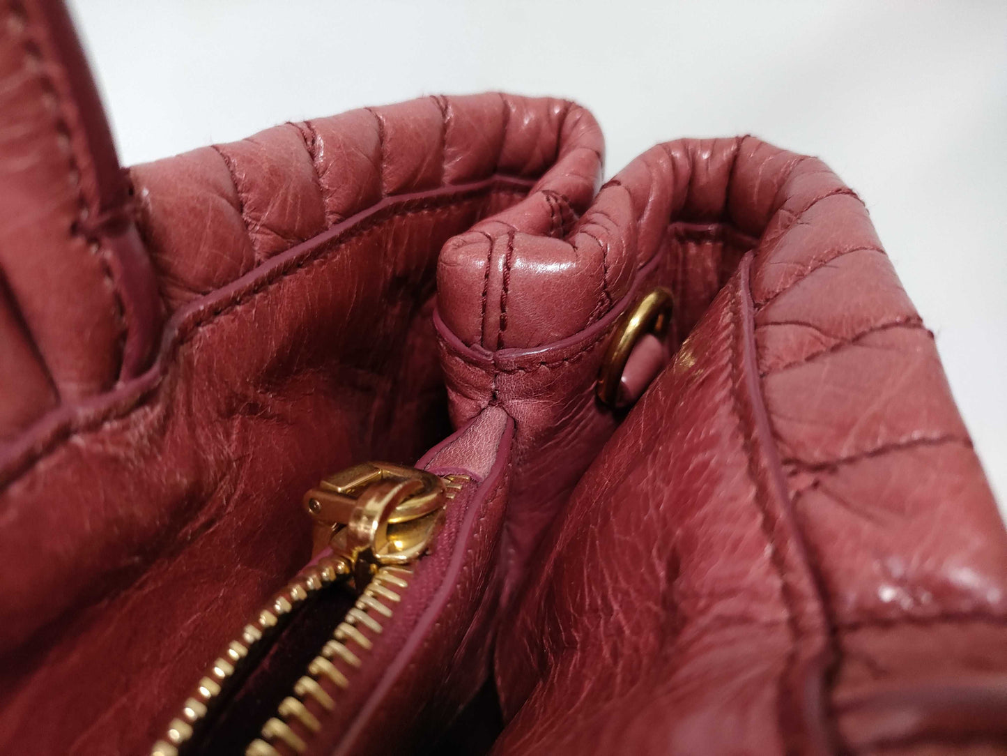 Miu Miu 2-way shoulder bag with Matelasse logo and leather handbag