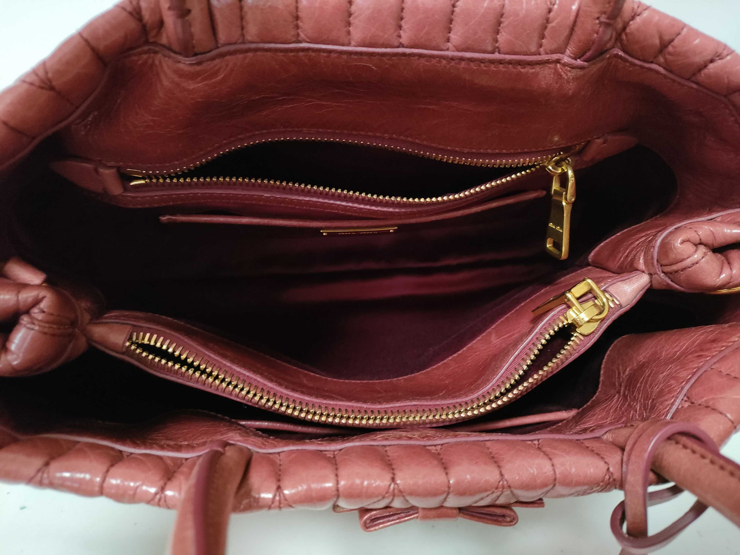 Miu Miu 2-way shoulder bag with Matelasse logo and leather handbag