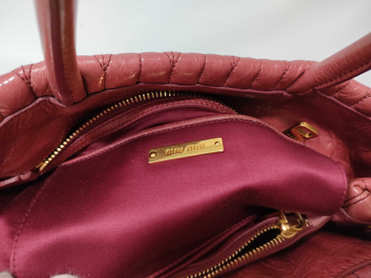 Miu Miu 2-way shoulder bag with Matelasse logo and leather handbag