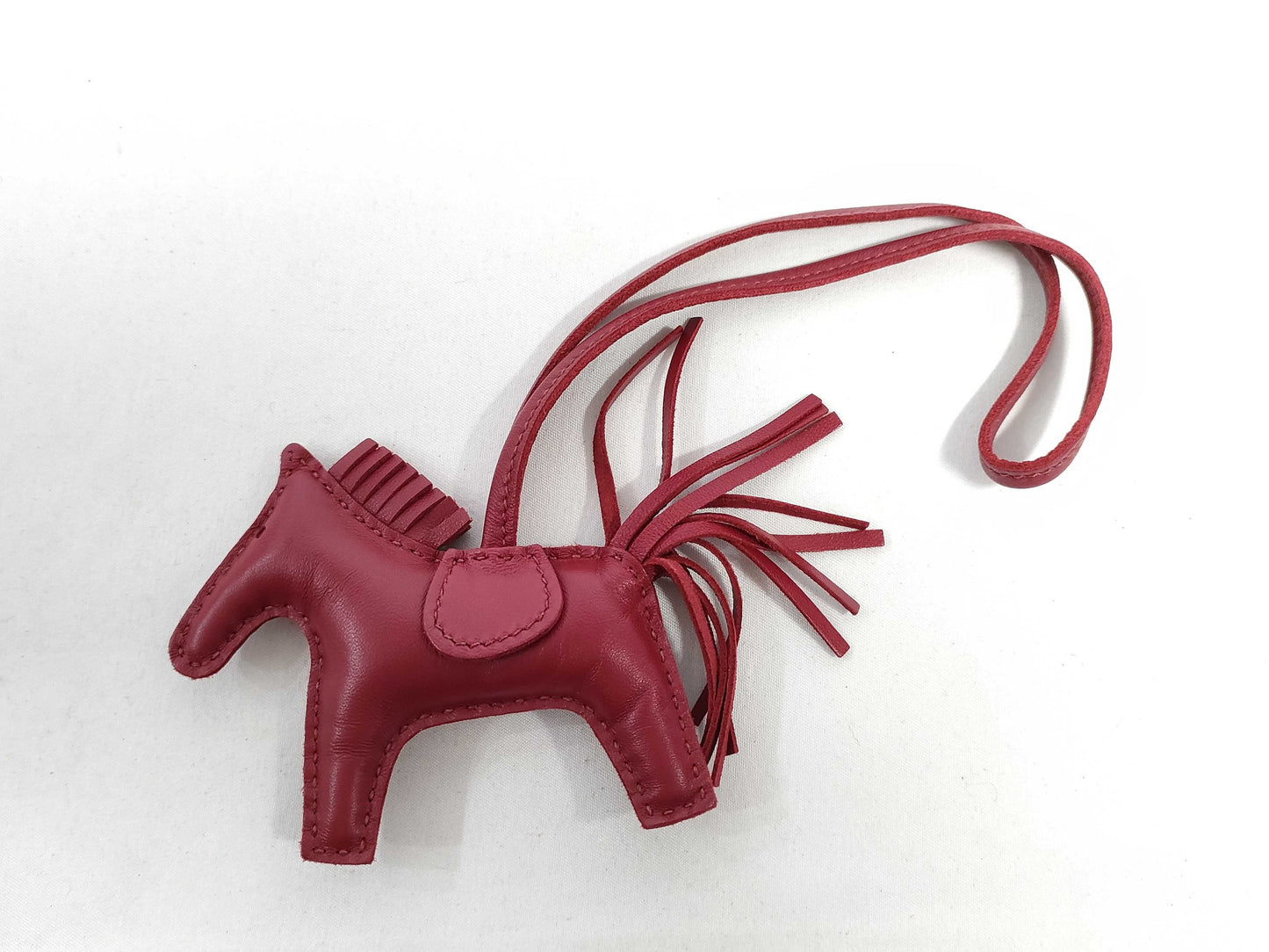 HERMES Brand New, Unused HERMES Rodeo Charm PM Ruby Anjou Milo Y Stamp Bag Charm Other Accessories