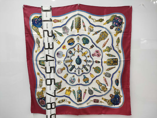 HERMES Carré 90 "Pourvu qu on ait l ivresse" perfume bottle, red scarf