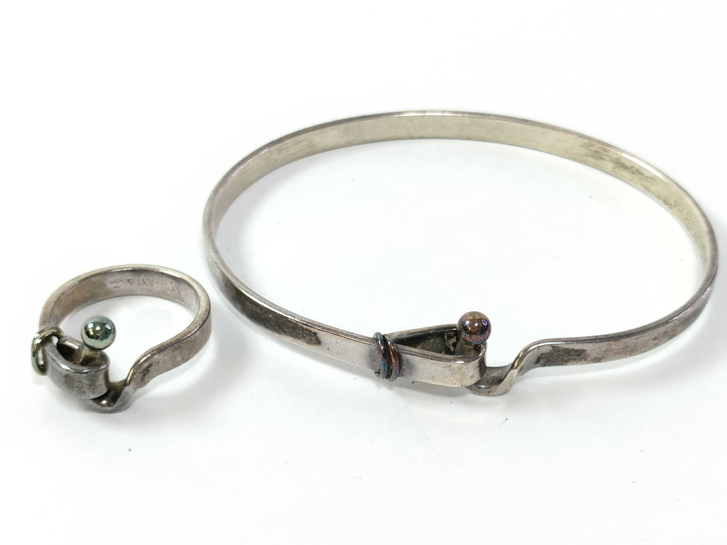 Tiffany & Co. Tiffany Love Knot Press + Ring Accessories Summary Accessories Summary
