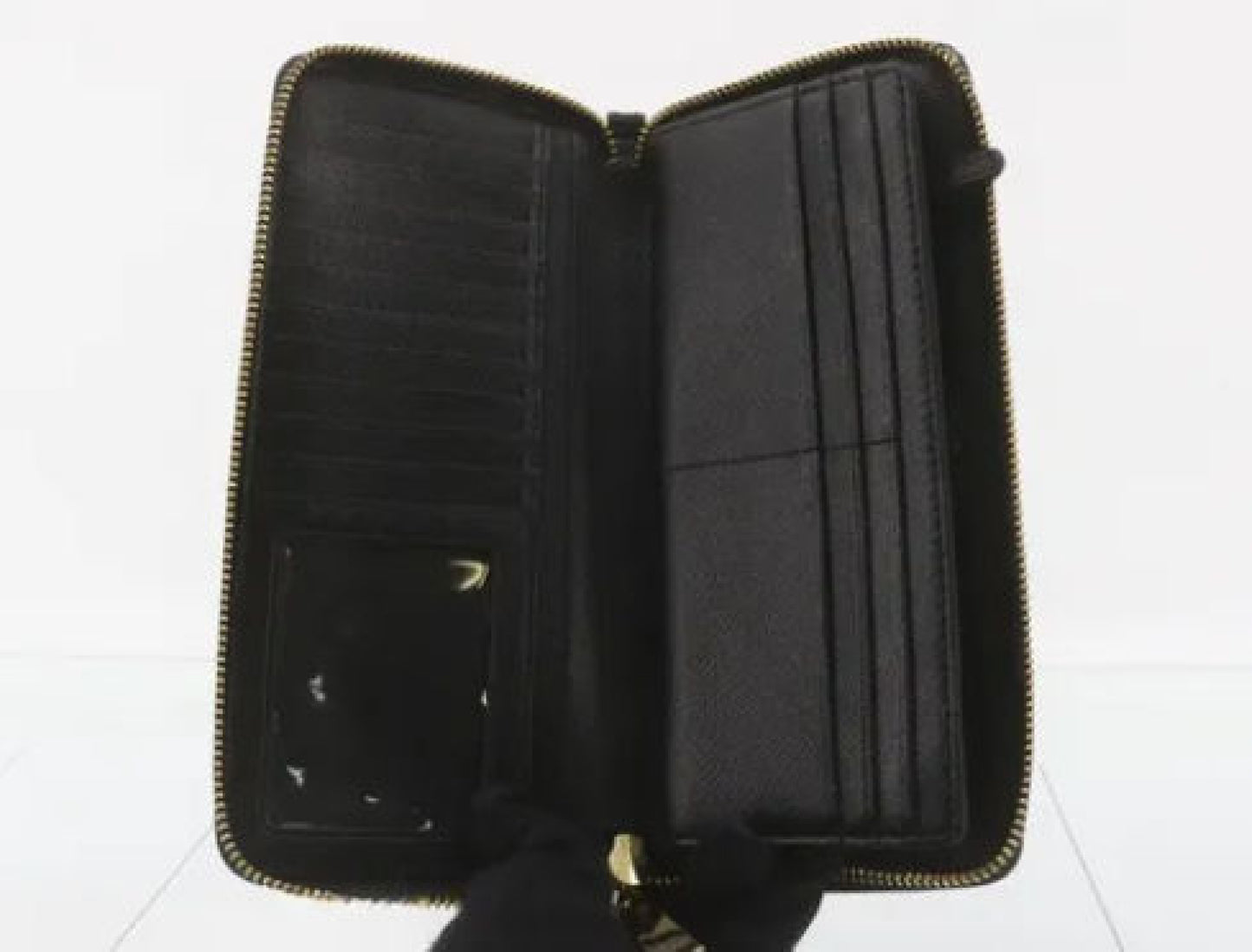 Michael Kors long wallet with round zipper