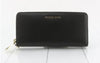Michael Kors long wallet with round zipper