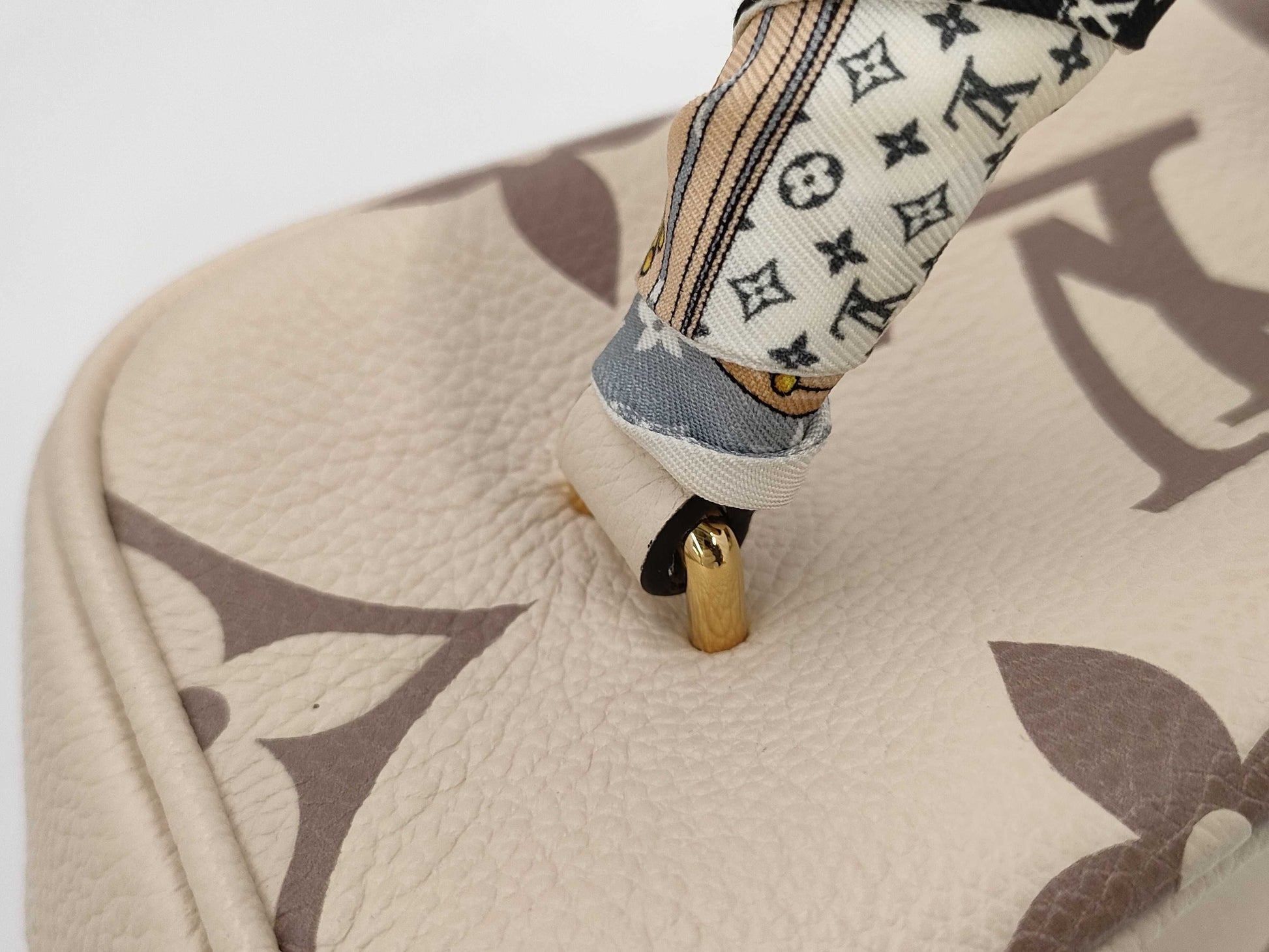 LOUIS VUITTON M45599 Monogram Empreinte Vanity PM Handbag with RFID Ready Scarf, Strap, Cloche, Padlock, Two Keys, and Dust Bag