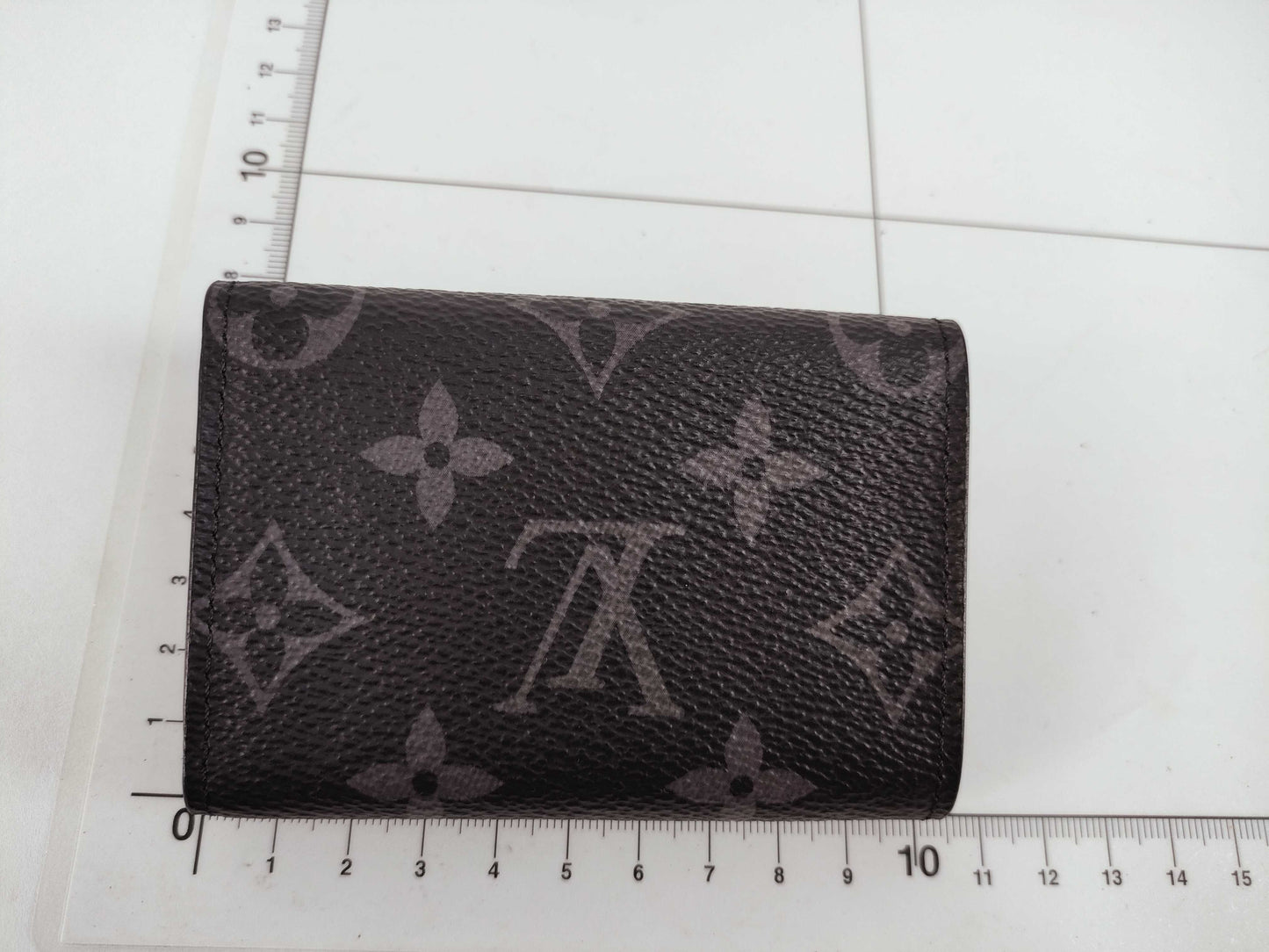 LOUIS VUITTON Monogram Eclipse Reverse Tri-fold Wallet