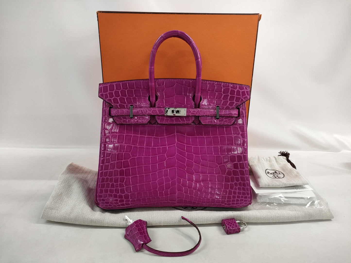 HERMES Birkin 25 Niloticus Rose Scheherazade Handbag with Silver Hardware and Q Stamp
