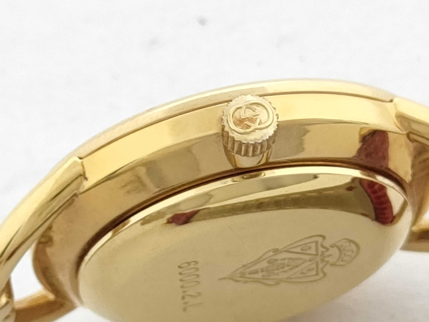 GUCCI Model Number 6000.2.L Serial Number 0249068 GP/Leather/QZ White Dial Non-Working/No Operational Guarantee Women's Watch