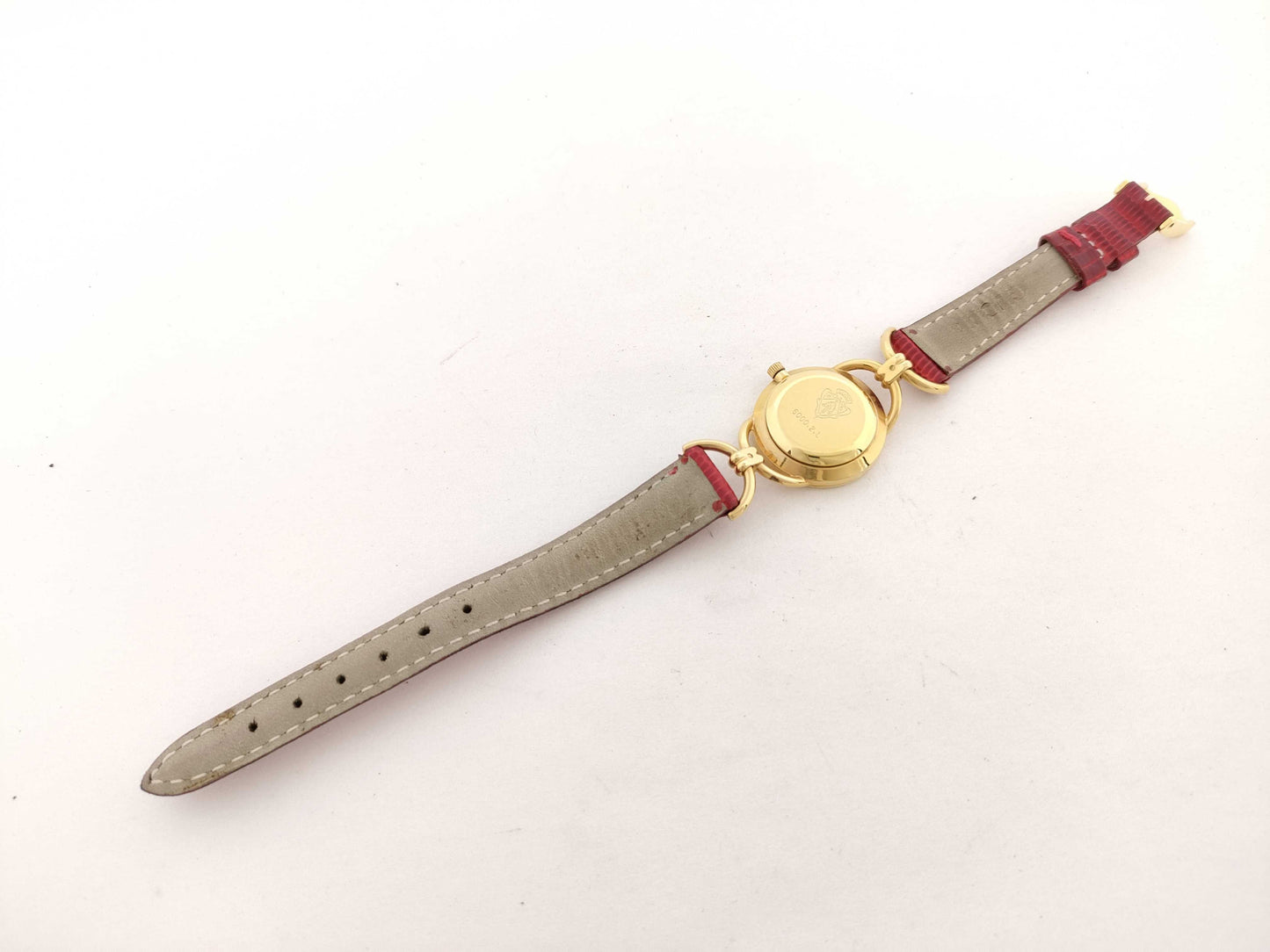 GUCCI Model Number 6000.2.L Serial Number 0249068 GP/Leather/QZ White Dial Non-Working/No Operational Guarantee Women's Watch