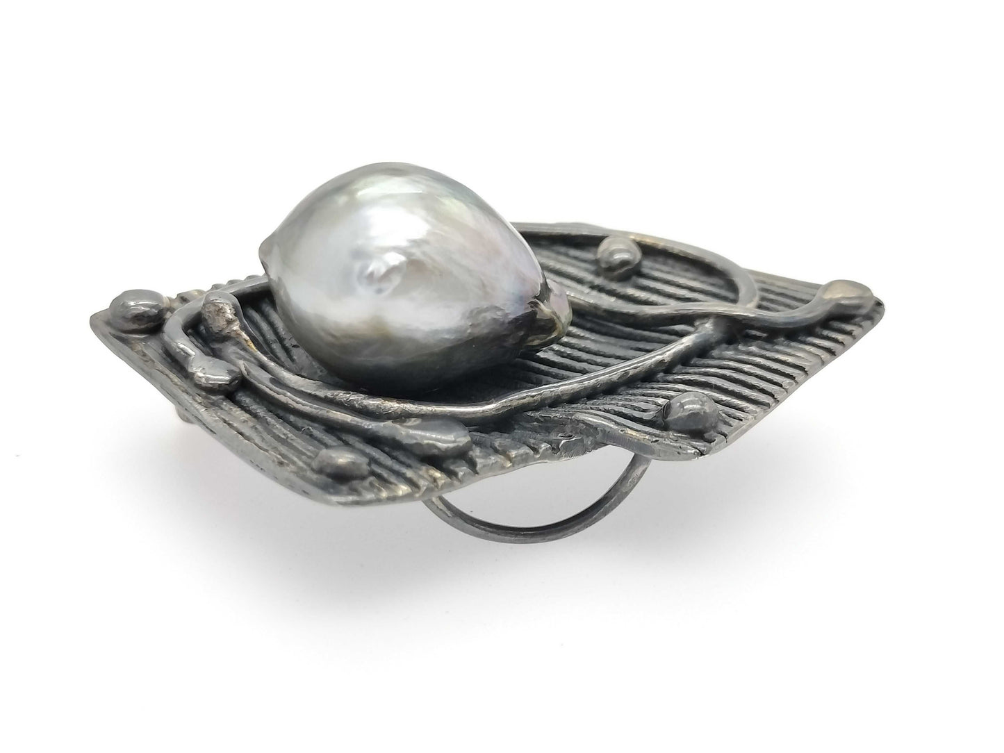 Pearl-like brooch, silver color