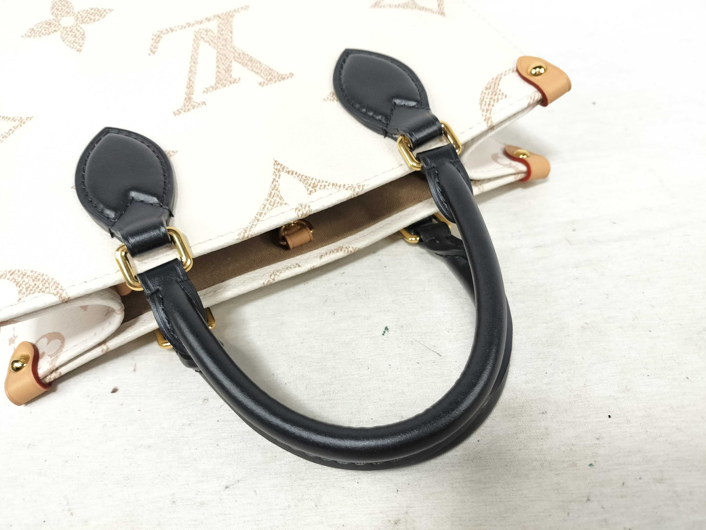 LOUIS VUITTON LV Monogram Dune On the Go PM Handbag, 2-Way, M24533, RFID Enabled, Shoulder Strap and Pouch Included, White/Black