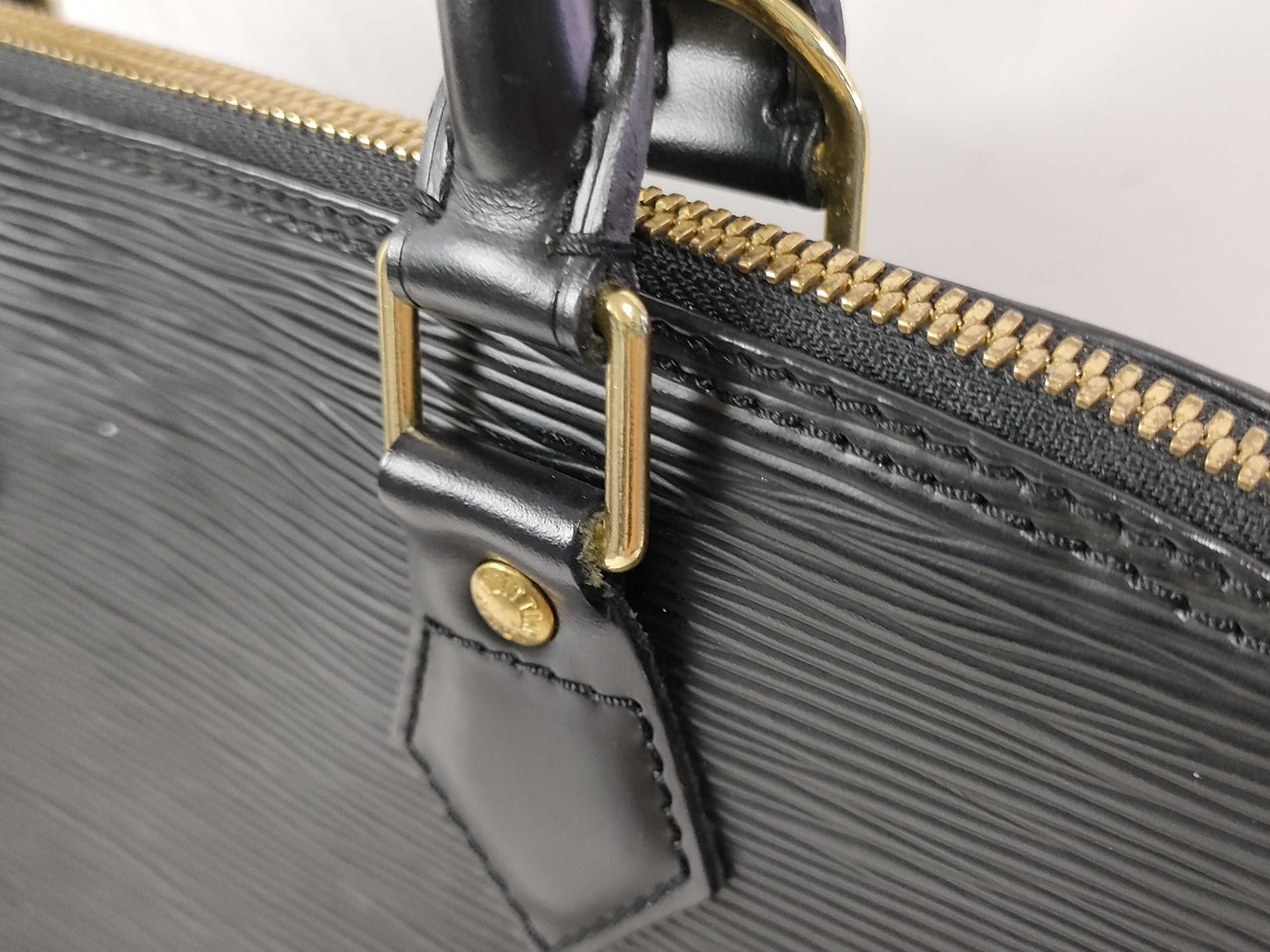 LOUIS VUITTON Epi Alma Noir Handbag