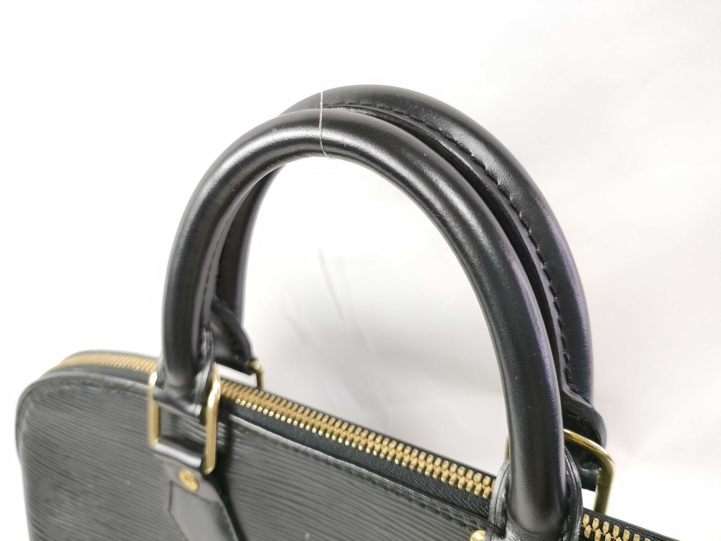 LOUIS VUITTON Epi Alma Noir Handbag