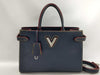 LOUIS VUITTON Twist Tote Bag