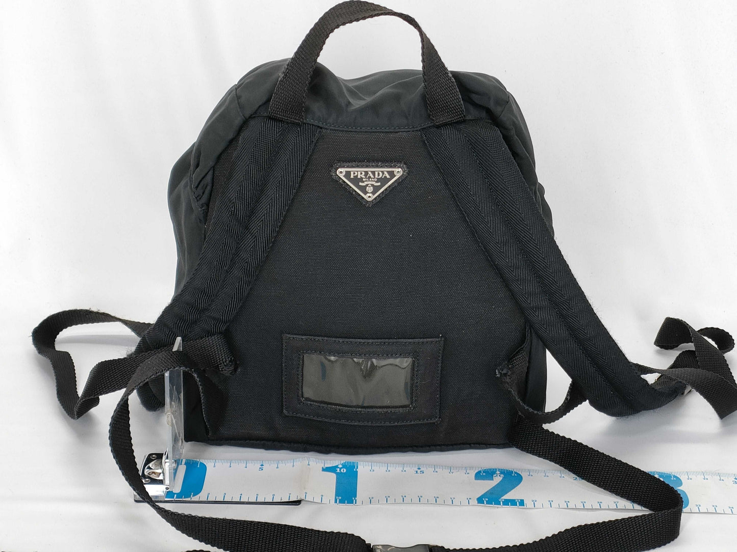 PRADA Nylon Backpack in Black with Triangle Logo Plate