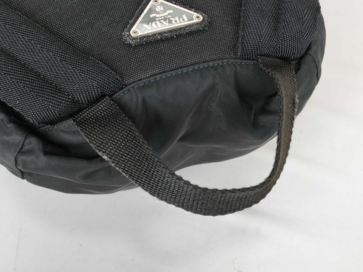 PRADA Nylon Backpack in Black with Triangle Logo Plate