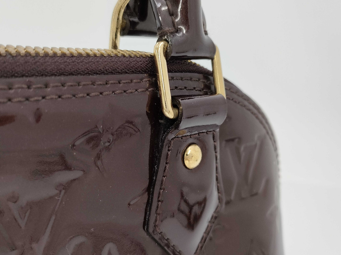 LOUIS VUITTON Vernis Alma BB Handbag
