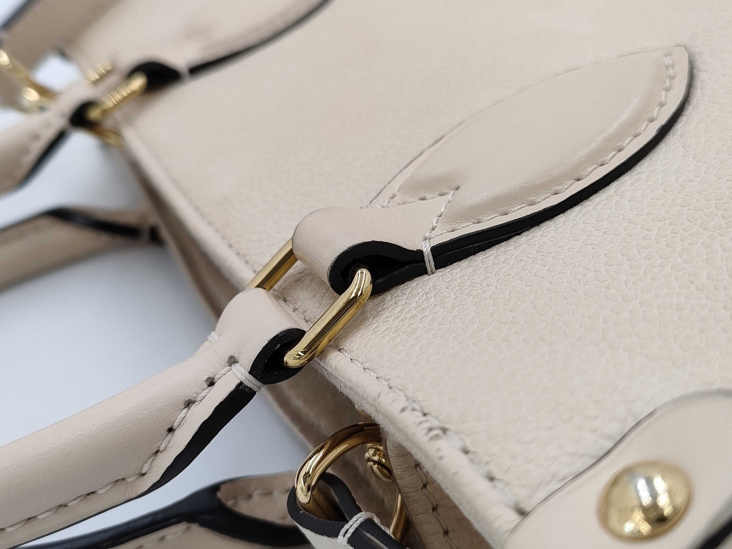 LOUIS VUITTON M46569 Empreinte Giant On the Go PM Crème with Shoulder Strap, RFID Verified Handbag