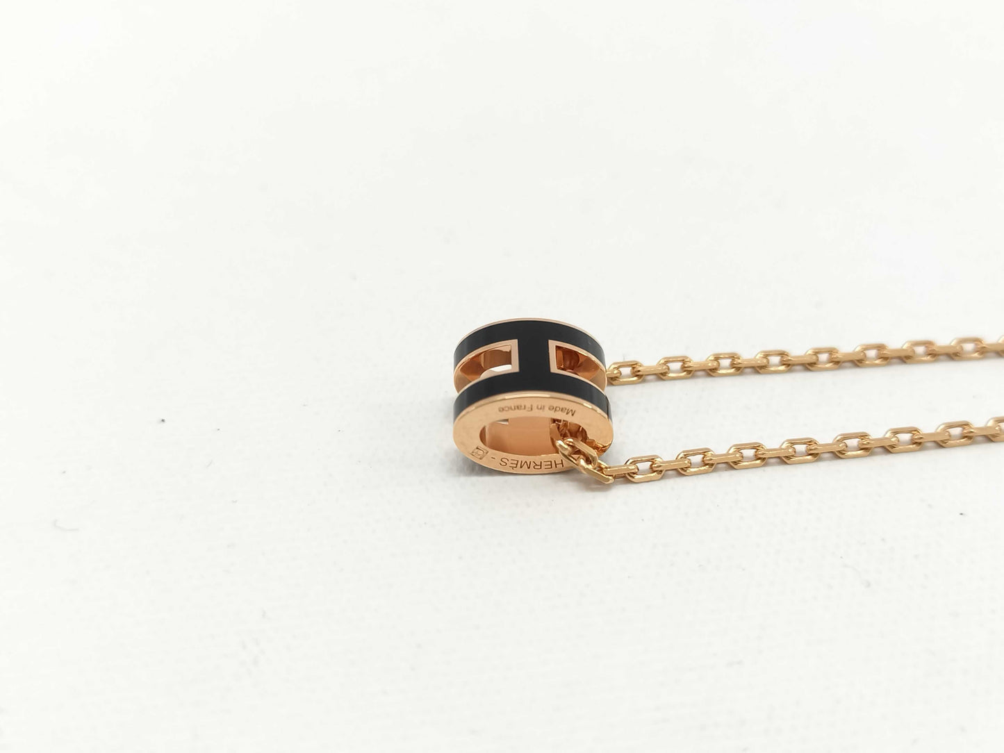 HERMES "Mini Pop H" Black and Pink Gold Hardware Necklace
