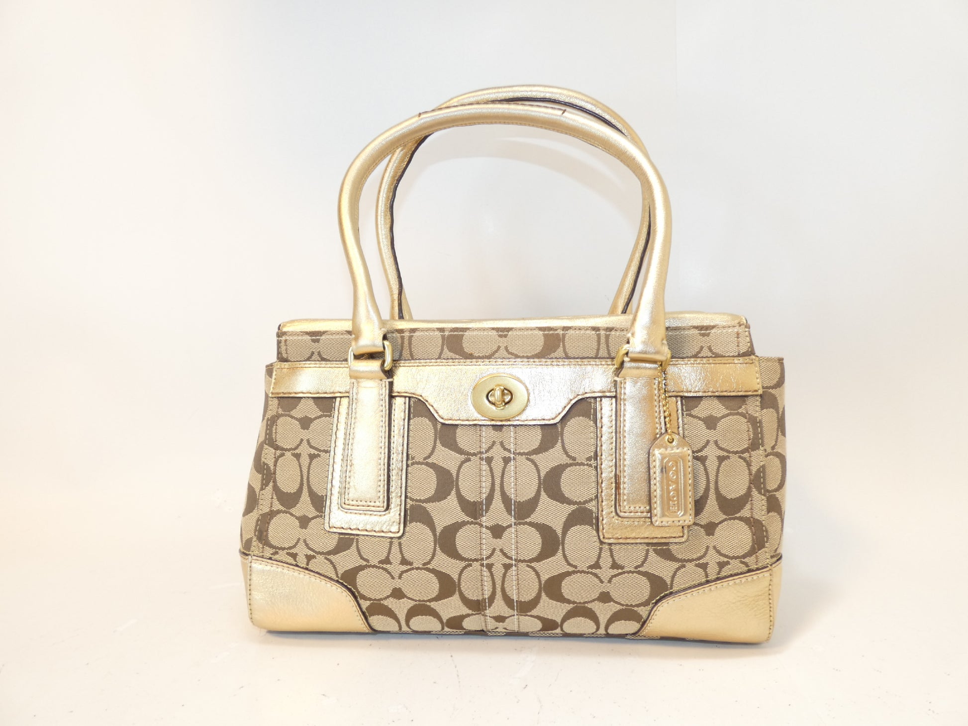 COACH Turnlock Signature Gold Canvas and Leather Hand Boston Bag