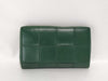 BOTTEGA VENETA Intrecciato Bottega Maxi Intrecciato Round Zip Long Wallet in Green Leather. Accessories: Box and Dust Bag.