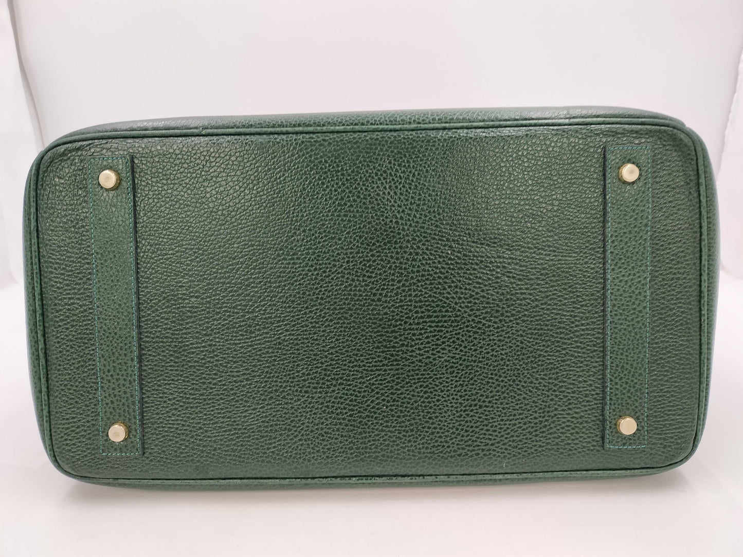 Green handbag with padlock, key and clochette