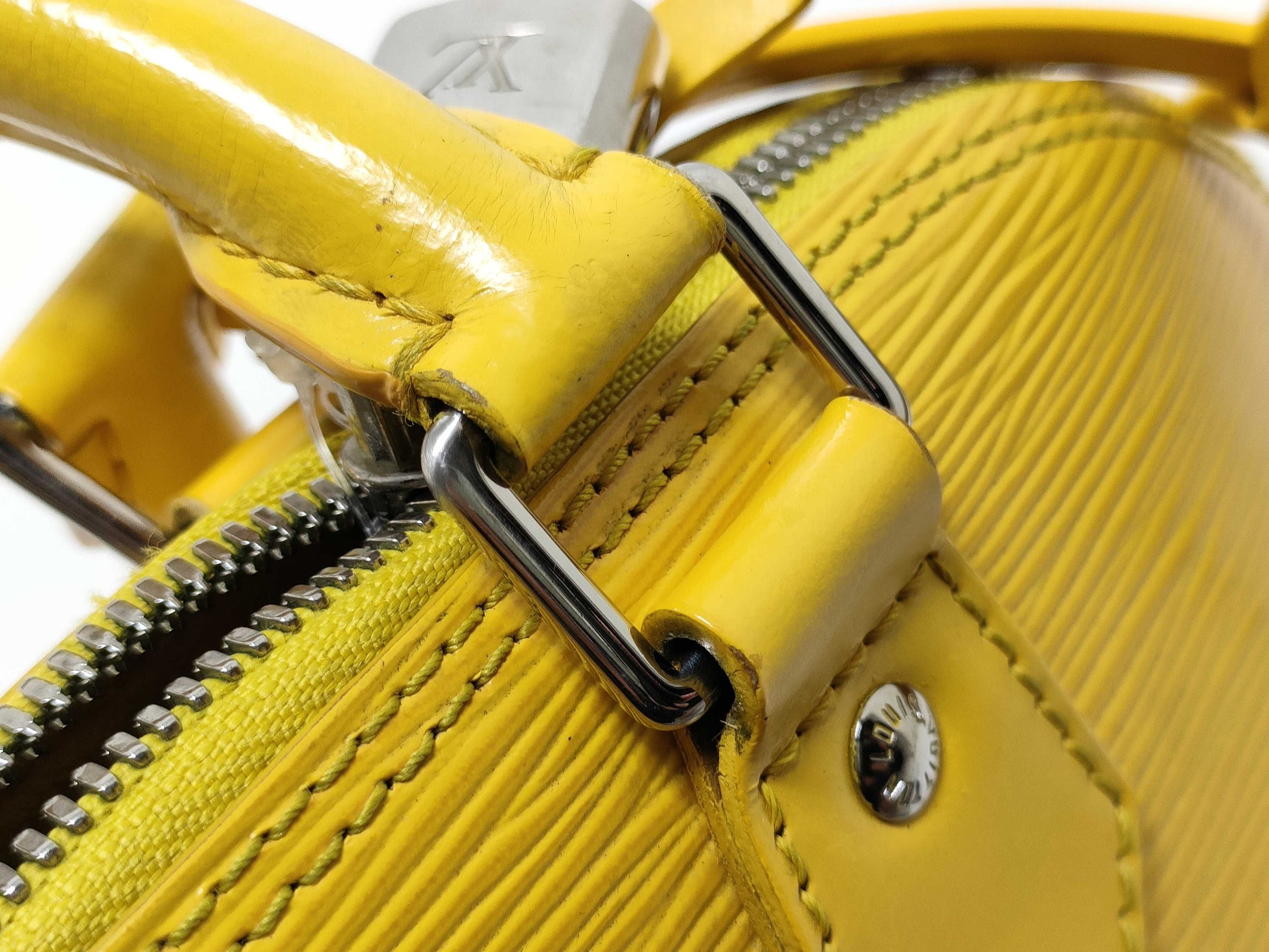 LOUIS VUITTON Epi LVLV Alma Epi Handbag
