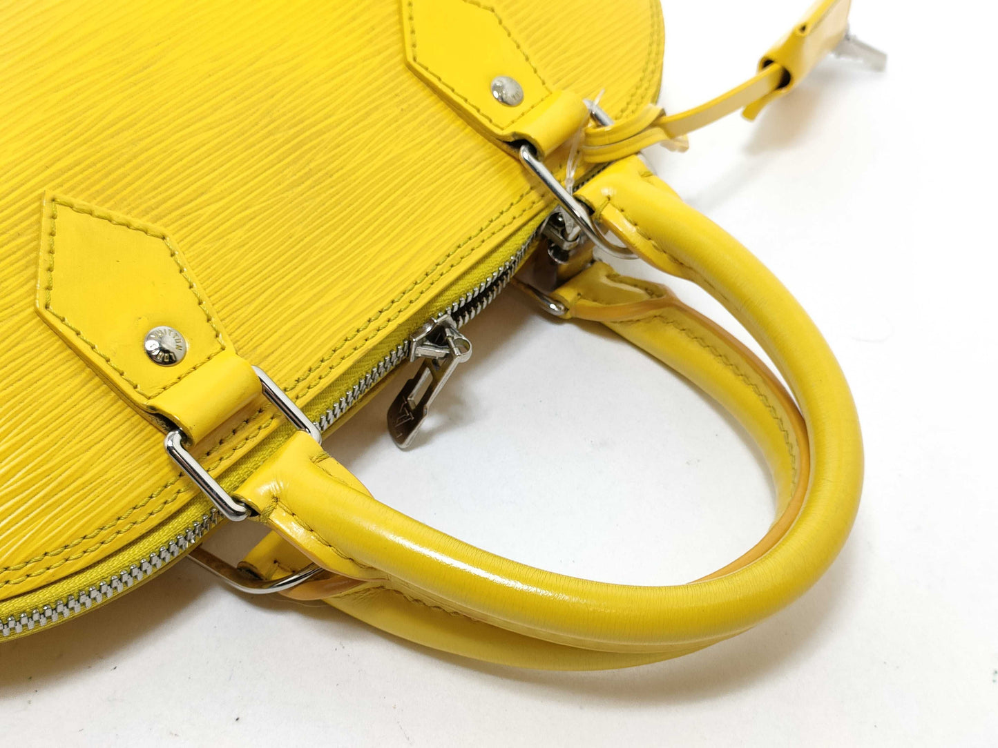 LOUIS VUITTON Epi LVLV Alma Epi Handbag