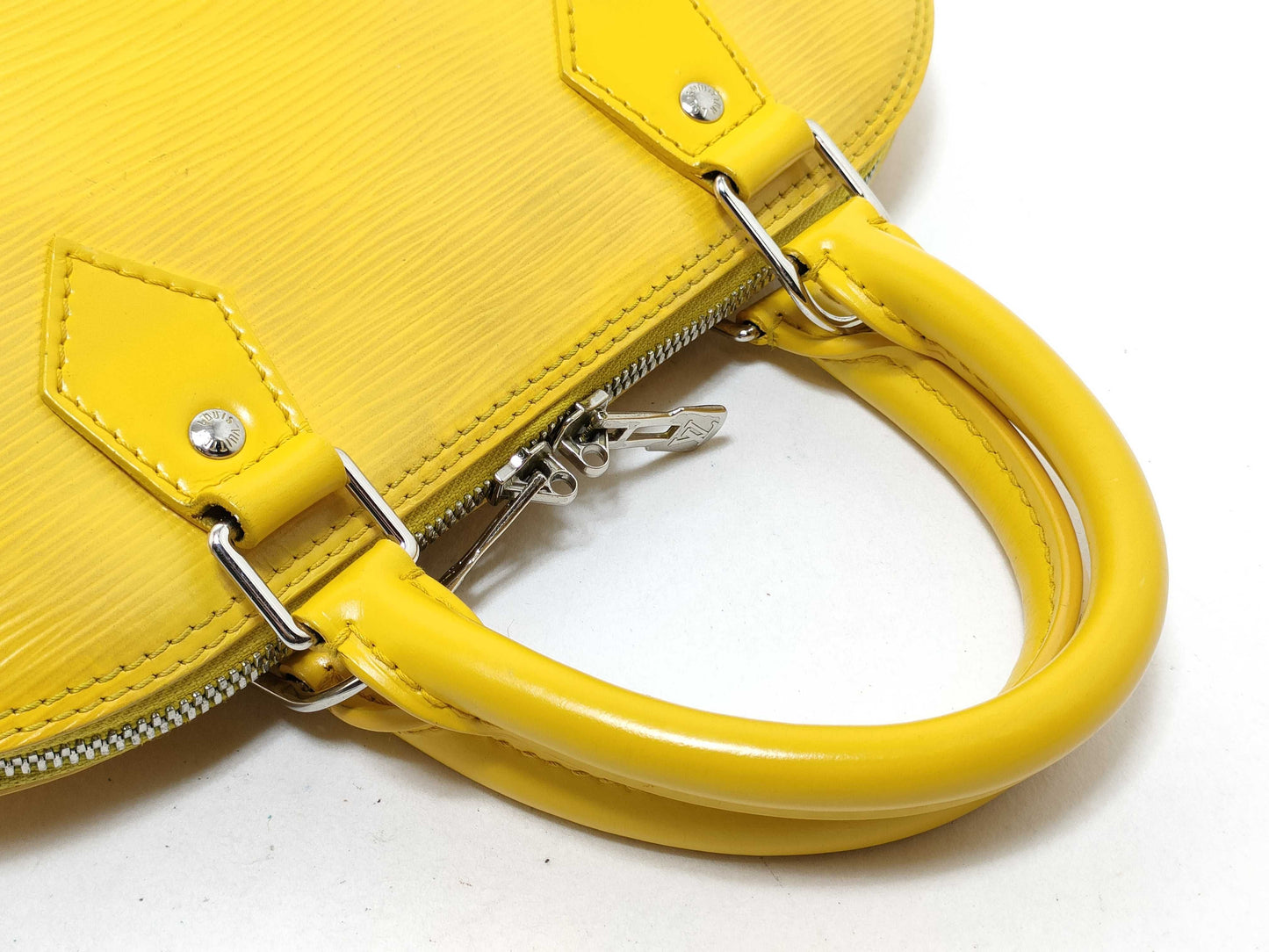LOUIS VUITTON Epi LVLV Alma Epi Handbag