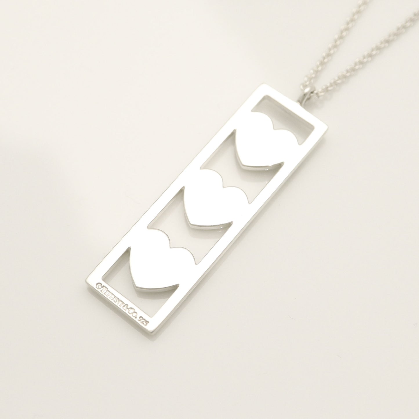 Tiffany & Co. Triple Heart Plate Necklace Pendant in Sterling Silver Weight: 2.58g