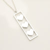 Tiffany & Co. Triple Heart Plate Necklace Pendant in Sterling Silver Weight: 2.58g