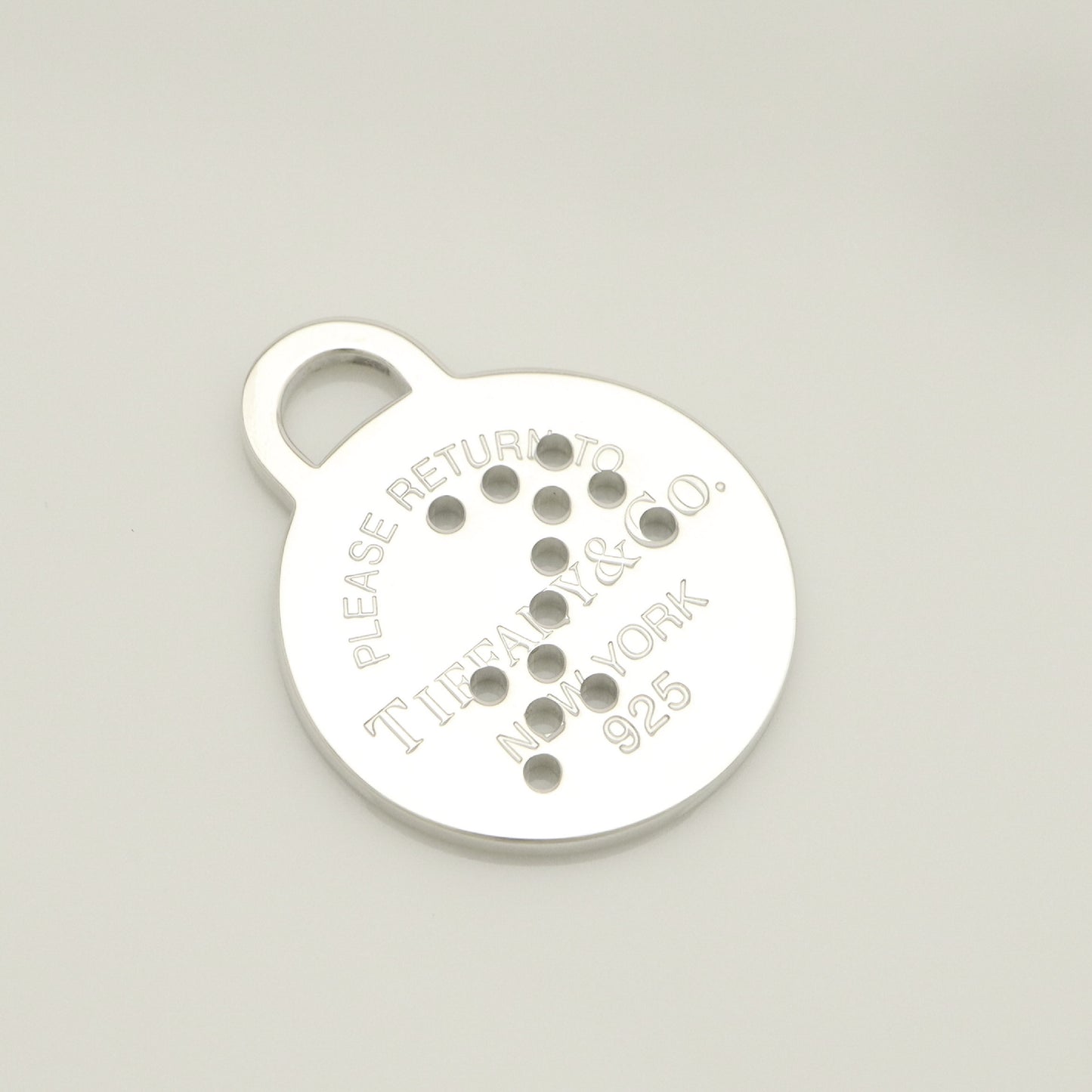 Tiffany & Co. Return to Tiffany Round Tag Arrow Punching Sagittarius Charm, 925 Sterling Silver, 8.20g