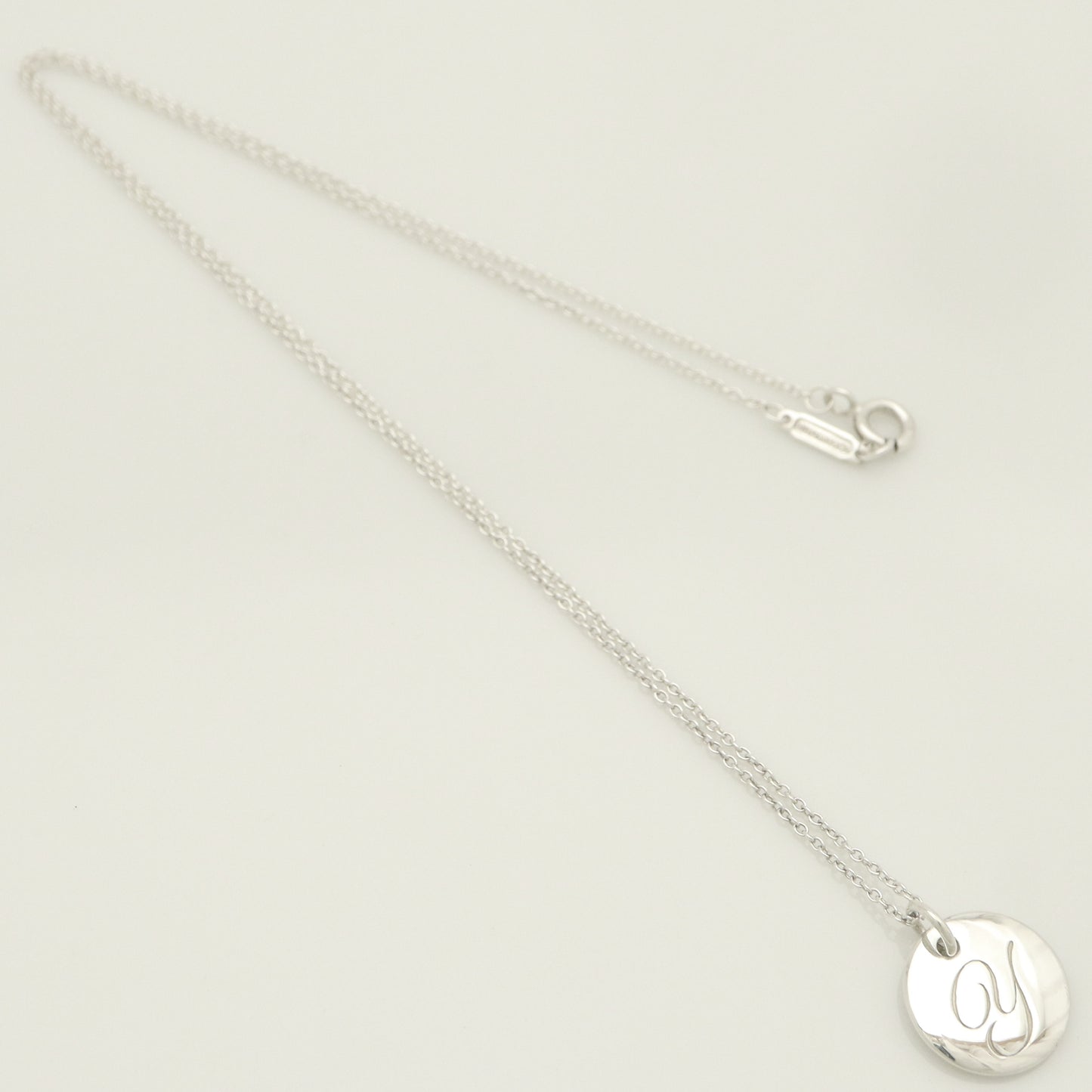 Tiffany & Co. Notes Letter Round Initial Y Disc Necklace in Sterling Silver - Weight: 3.01g