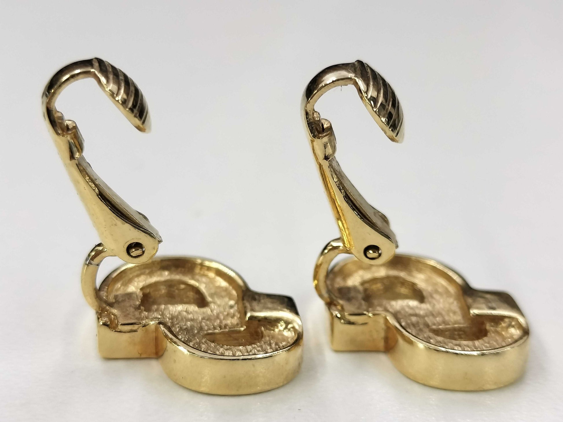 Dior Christian Dior CD logo earrings with rhinestones in gold.
