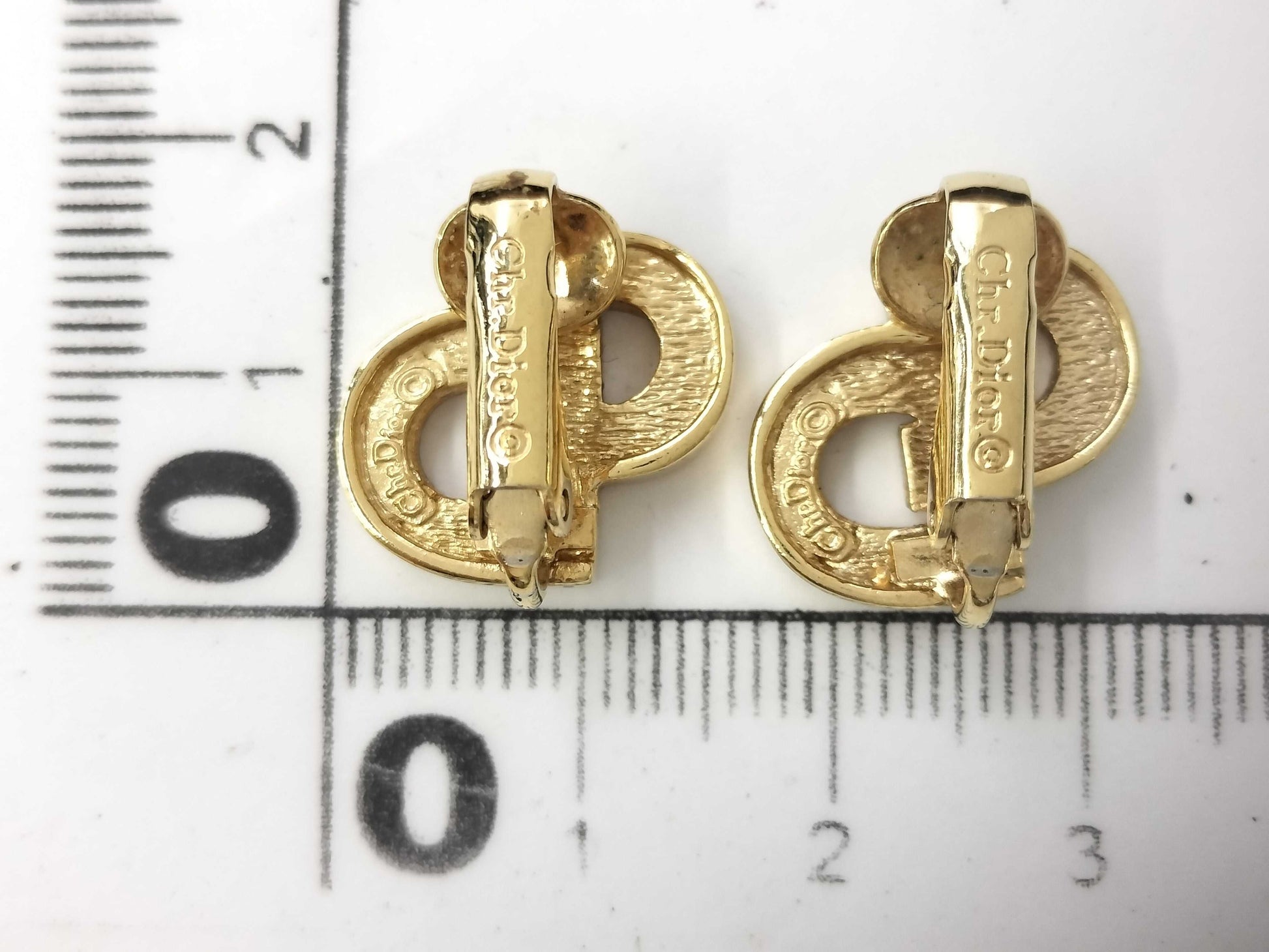 Dior Christian Dior CD logo earrings with rhinestones in gold.