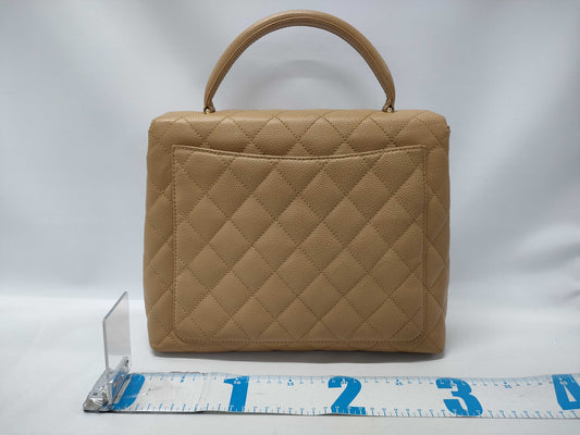 CHANEL Matelasse Coco Handle Handbag in Beige Caviar Leather 8422286