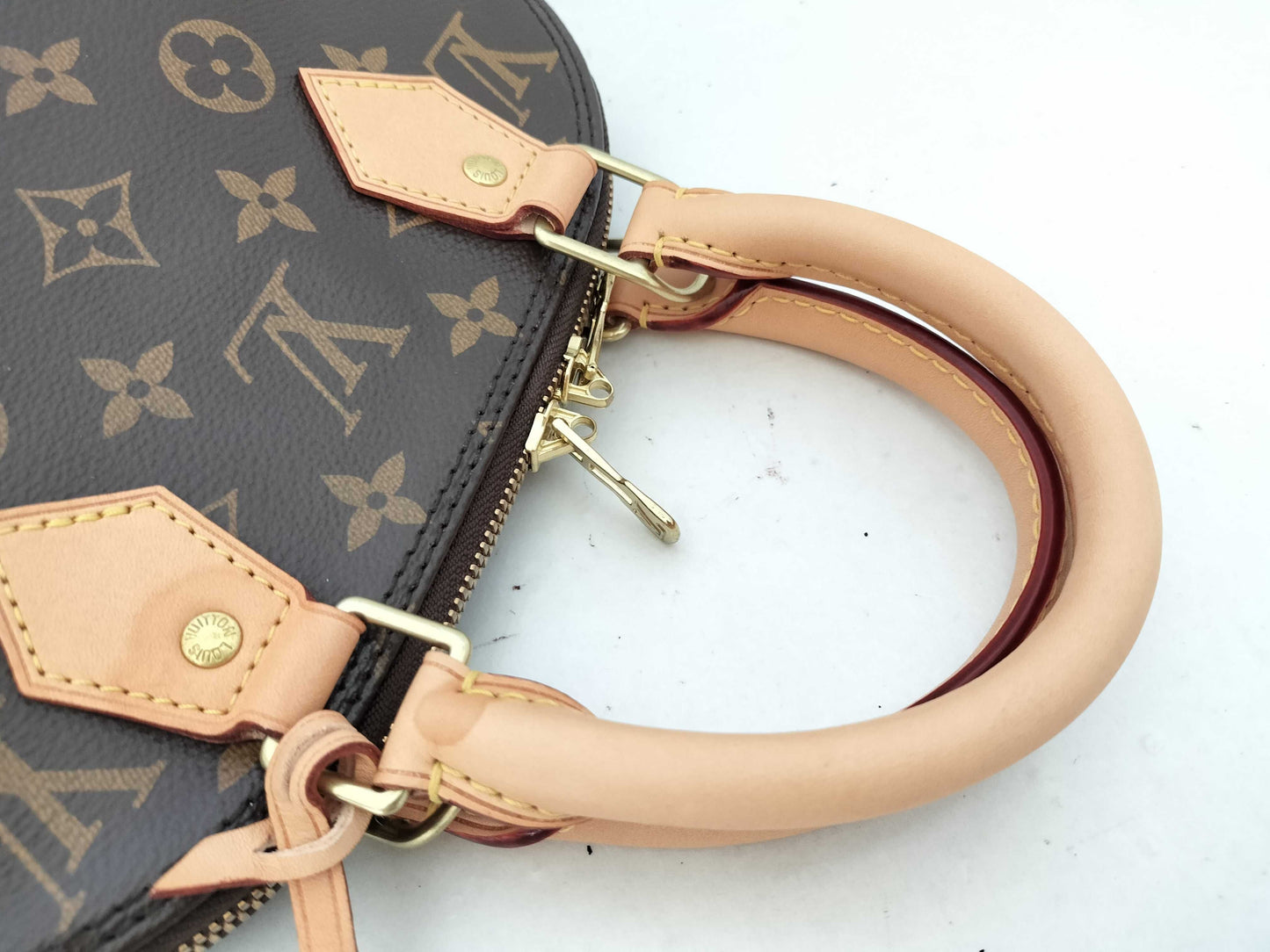 LOUIS VUITTON Monogram Louis Vuitton Alma BB Handbag